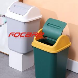 Plastic mold for waste bin with swinging lid 